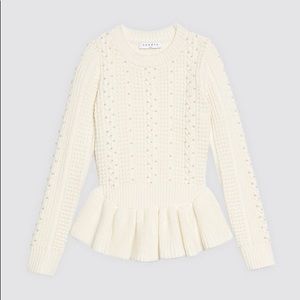 Sweater with peplum and pearls